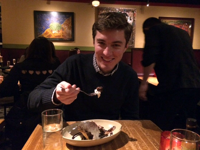 a man eating a cake