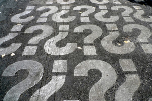 a group of question marks painted on the ground