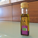 a small bottle of oil on a table