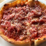 a deep dish pizza on a plate