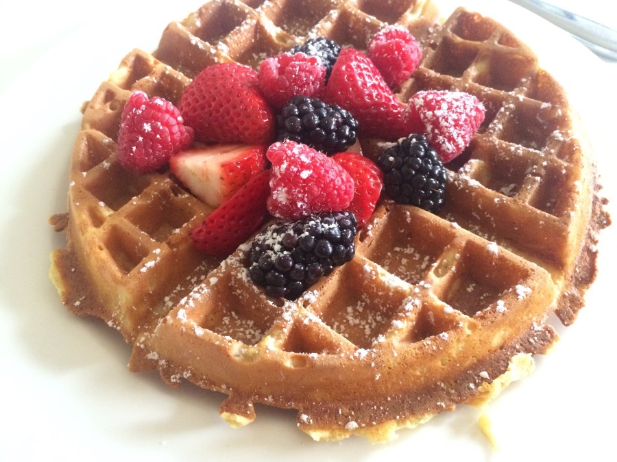 a waffle with berries on top