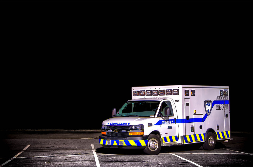 a white and blue ambulance