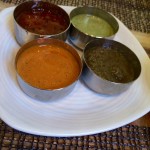 a plate of different sauces