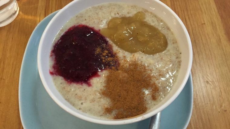 a bowl of oatmeal with different toppings