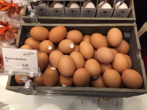 a wooden crate of eggs