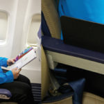 a child sitting in an airplane